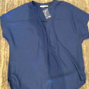 Women’s Lush short sleeve blouse.